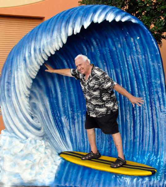 A masked surfer unveiled