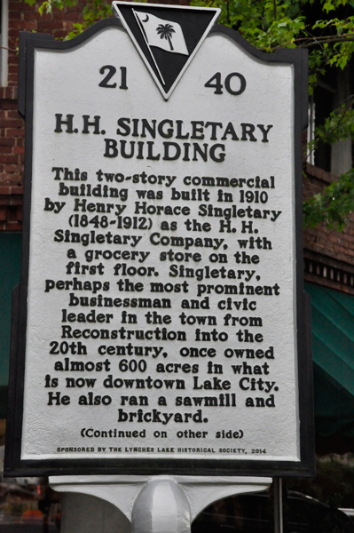 H.H. Singletary Building sign side 1