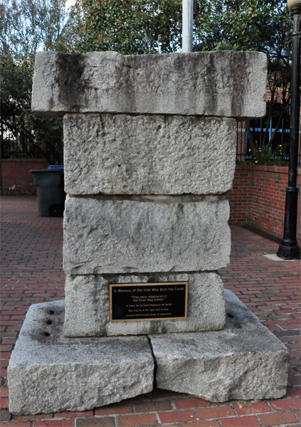 a monument in memory of the Irish who built the Canal.