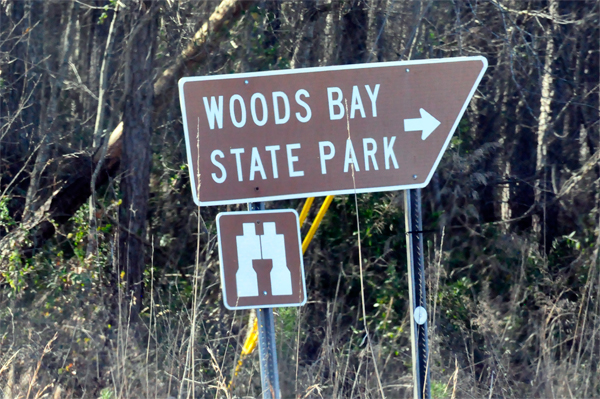 Woods Bay State Park directional sign