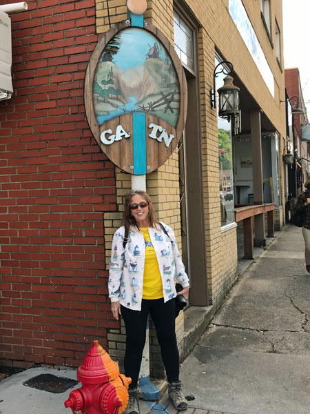 Karen Duquette standing in Georgia and Tennessee at the same time