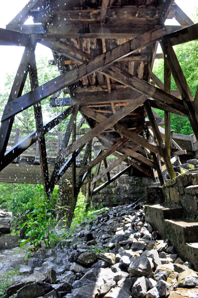 water flowing under the bridge