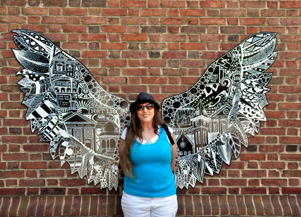 Karen Duquette with wings