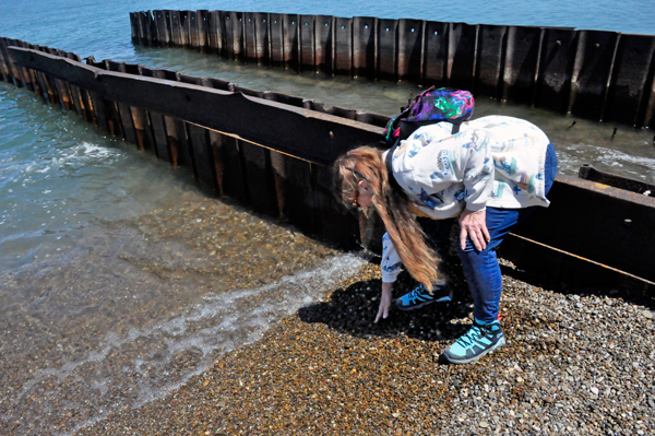 Karen Duquette felt the water temperature