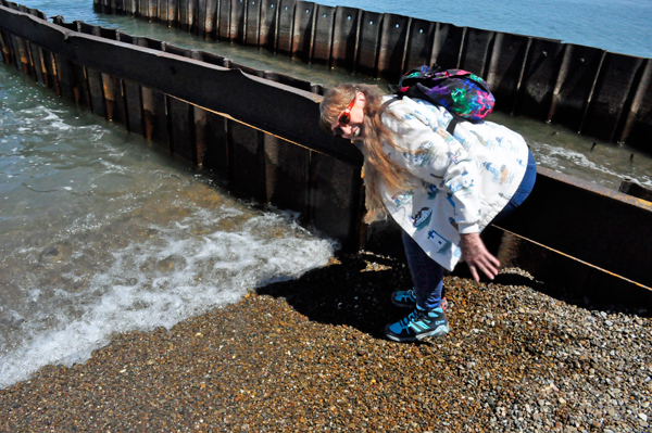 Karen Duquette felt the water temperature