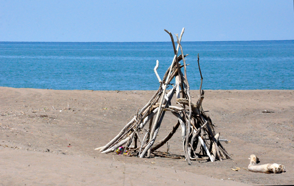 teepee foundation on the beach