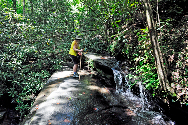 Karen Duquette by a cascade of water