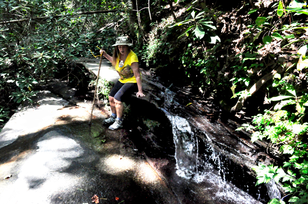 Karen Duquette by a cascade of water