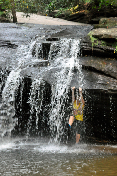 Karen Duquette behind the waterfall