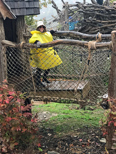 Karen Duquette on a small bridge