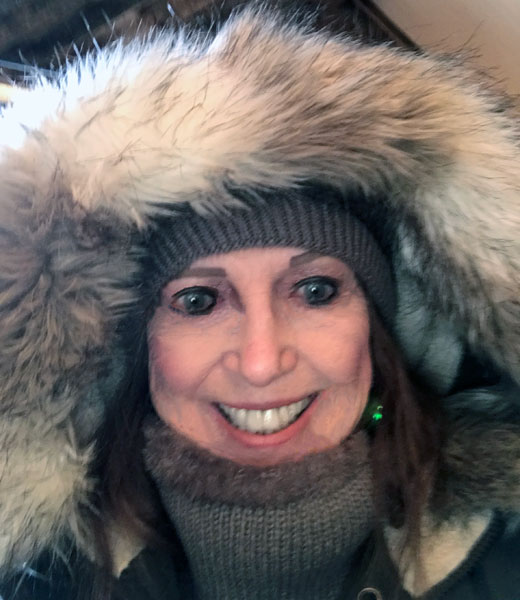 Karen Duquette bundled up