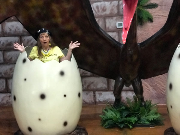 Karen Duquette in a Pteranodon egg