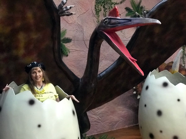 Karen Duquette in a Pteranodon egg