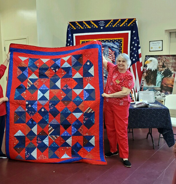 Joanie Bolten with Karen's Quilt of Valor