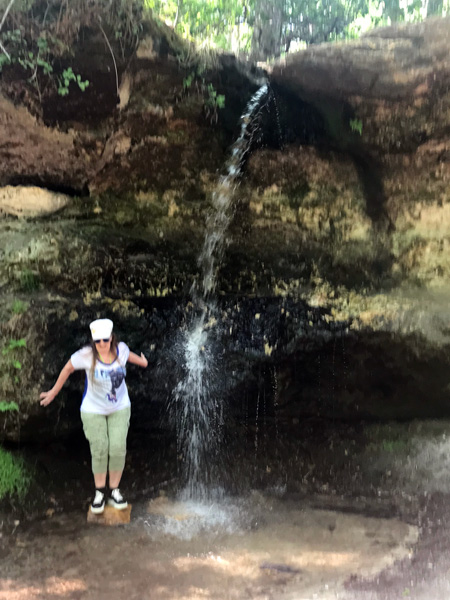 Karen Duquette by the waterfall