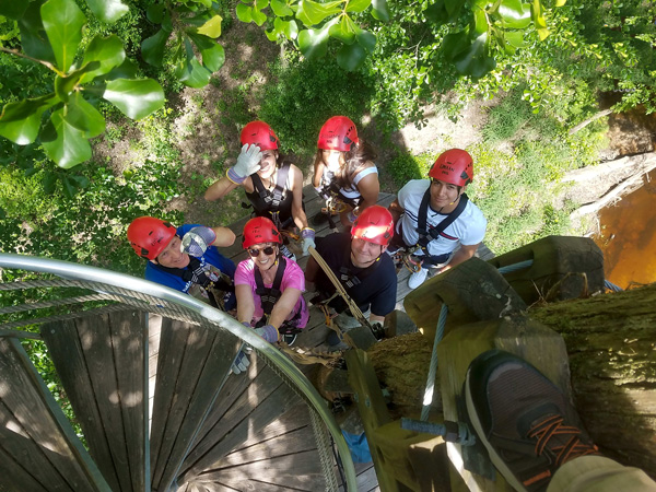 the gang down below a sprial staircase