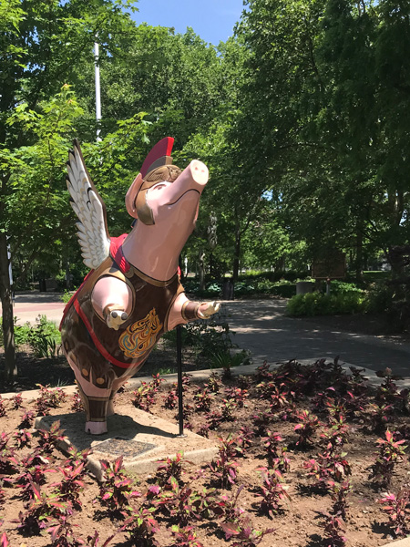 winged pig statue
