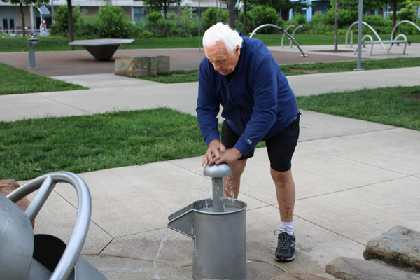 Lee Duquette playing with the water pump 