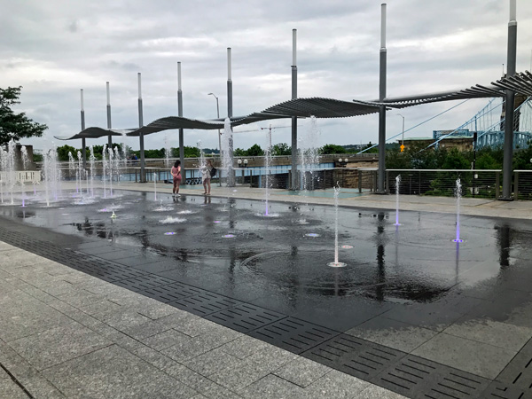 girls palying in the water fountain