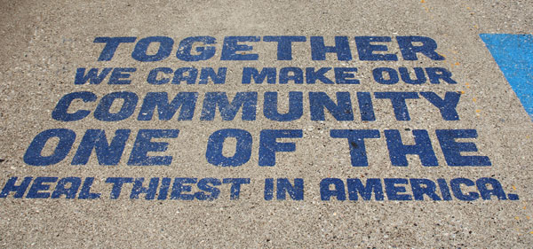 sign on the walkway of the bridge