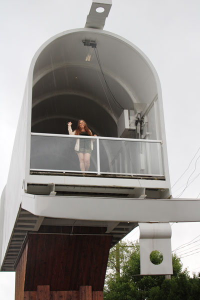 Karen Duquette inside the World's Largest Mailbox