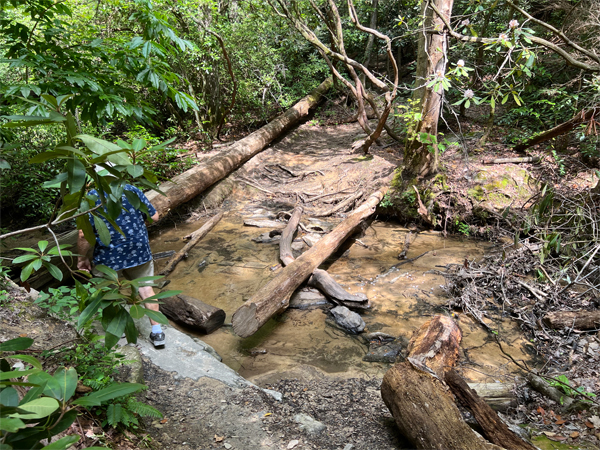 Lee Duquette making his way across another creek crossing