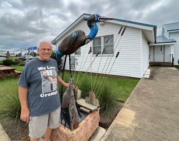 Lee Duquette and a painted stork