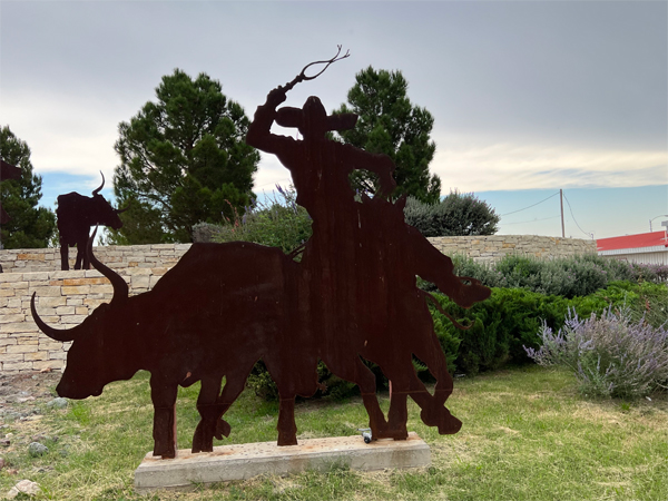 silhouette of the first cowboy on the open range