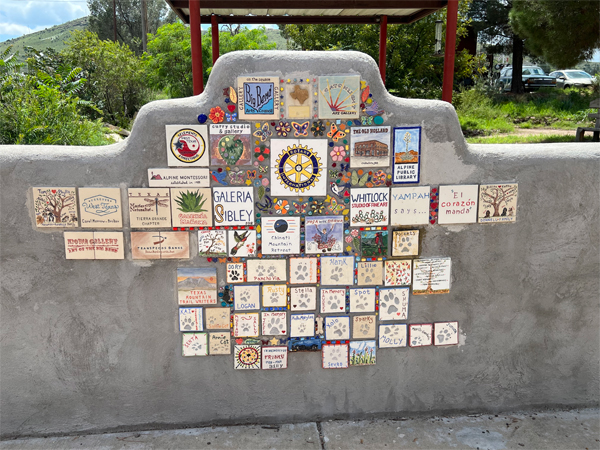 stickers on an Alpine Texas wall