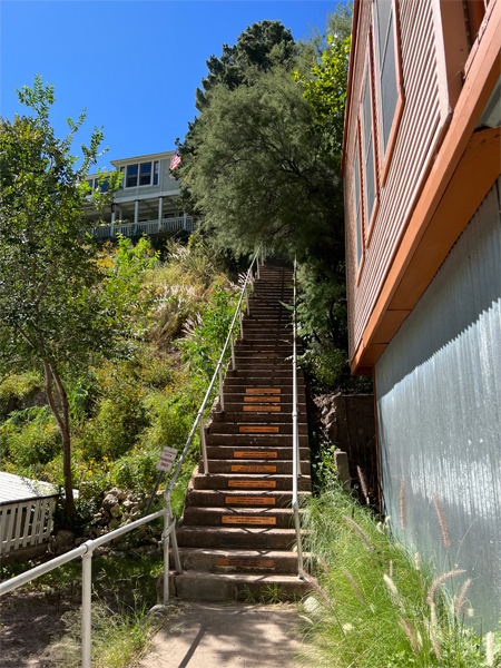 stairs leading up to  the house