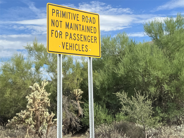 Primitive road sign