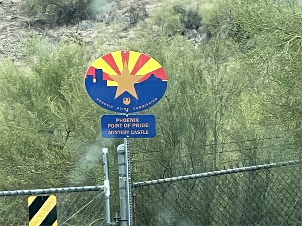 Mystery Castle sign and locked fence