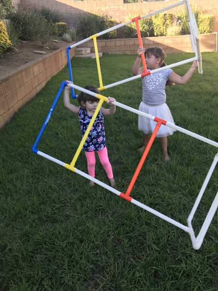 JJ and Emily playing in the yard