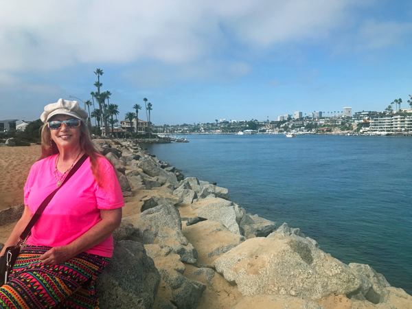 Karen Duquette relaxing on the rocks