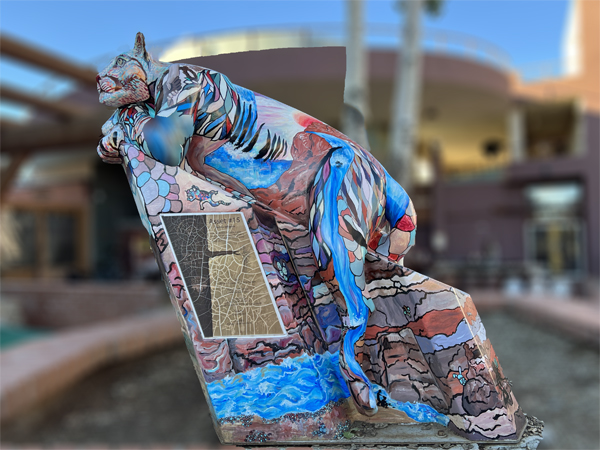 an amaxing statue outside a stadium