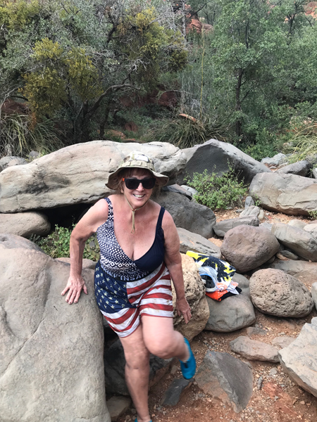 Karen Duquette approaching the top of the natural slide