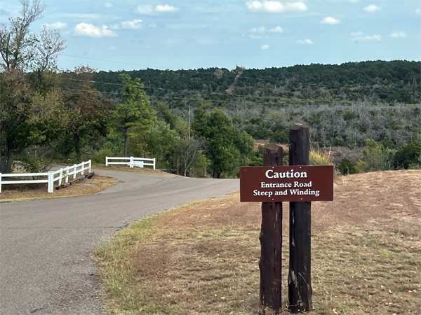 steep and winding road sign