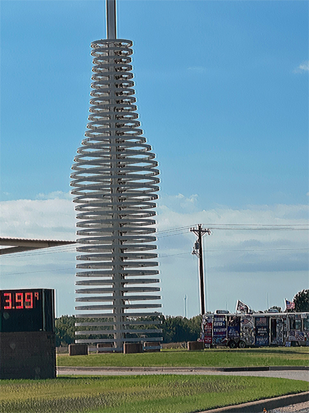 a large soda bottle and straw