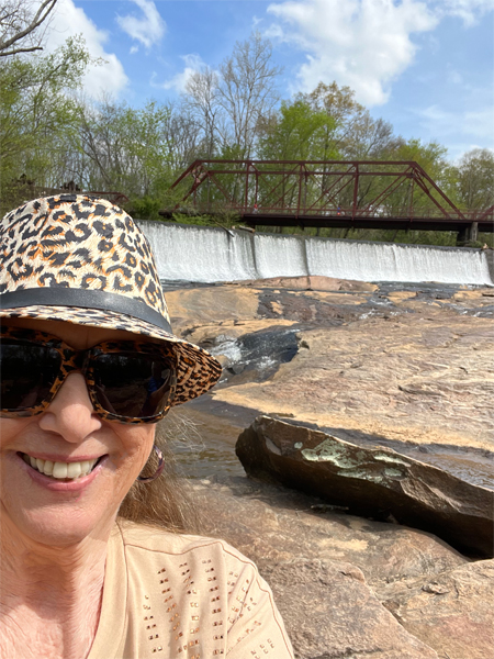Karen Duquete and the waterfall at Glendale Shoals