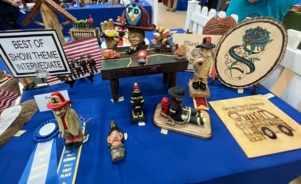 firemen woodcarving best of show theme