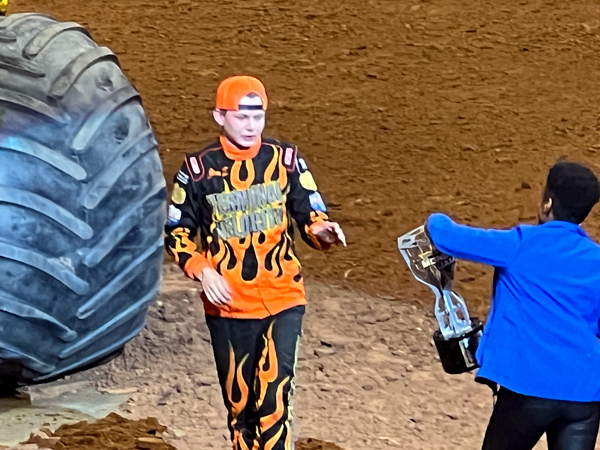receiving the trophy