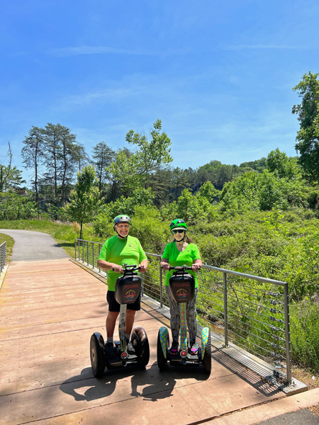 The two RV Gypsies on their Segways