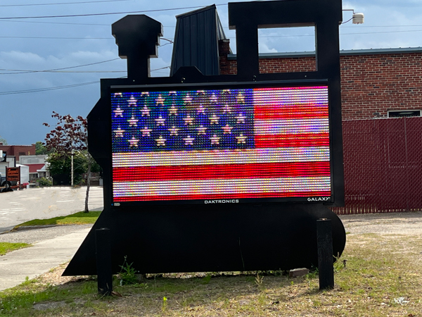 A train shaped billboard