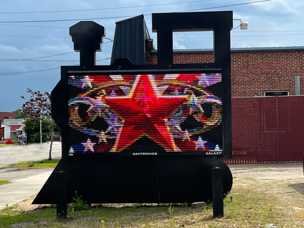 A train shaped billboard