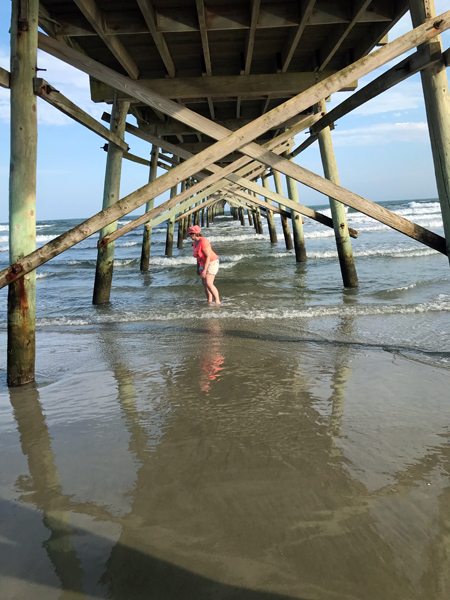 Karen Duquette under the Sunset Beach Pier