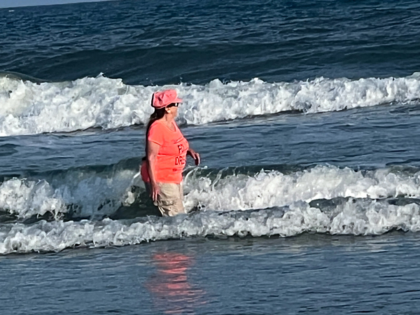 Karen Duquette playing im the oceacn at Sunset Beach