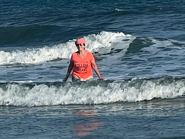 Karen Duquette playing im the oceacn at Sunset Beach