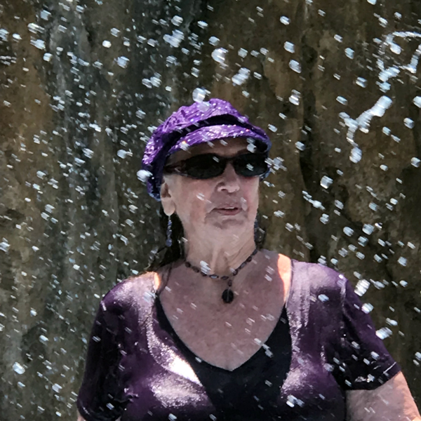 Karen Duquette under the waterfall