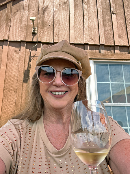 Karen Duquette enjoying the wine