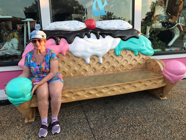 Karen Duquette on an ice cream bench